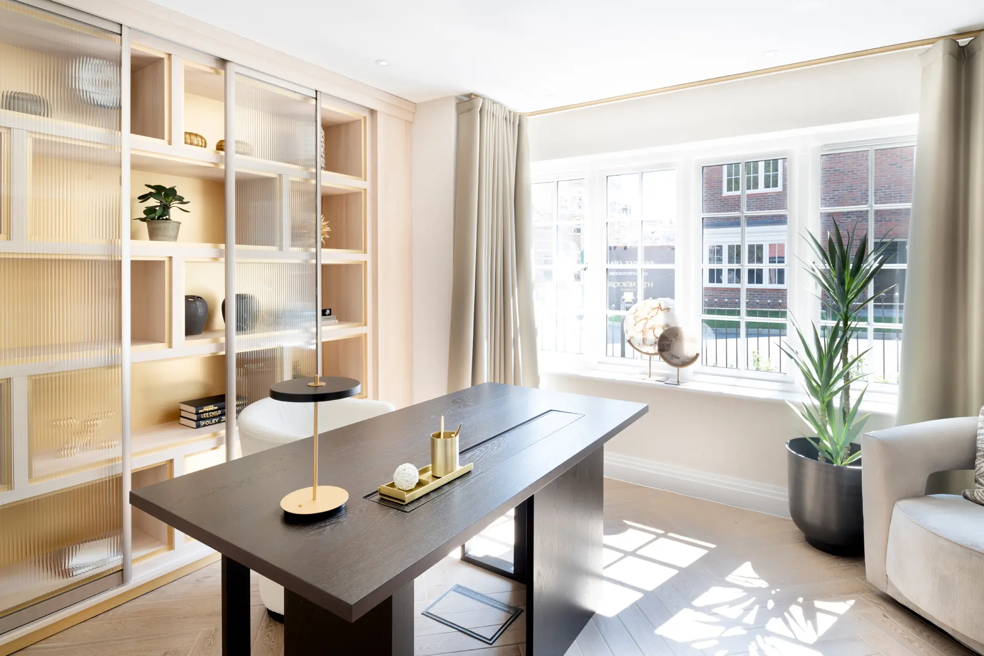 a room with a table and shelves