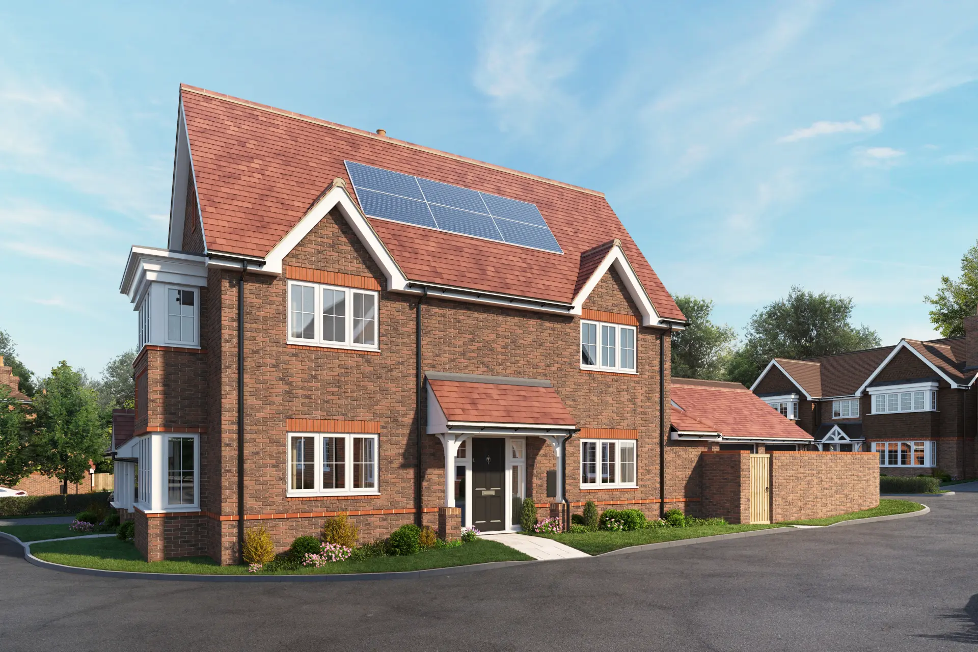 a brick house with solar panels on the roof
