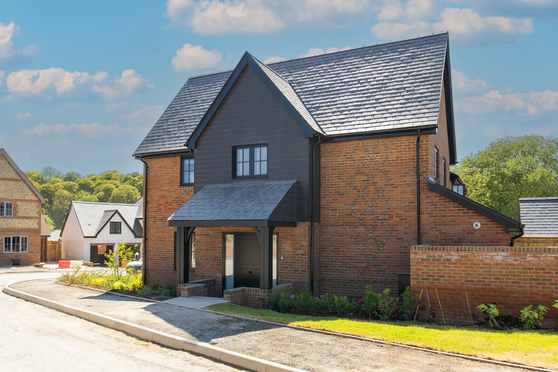 a brick house with a driveway