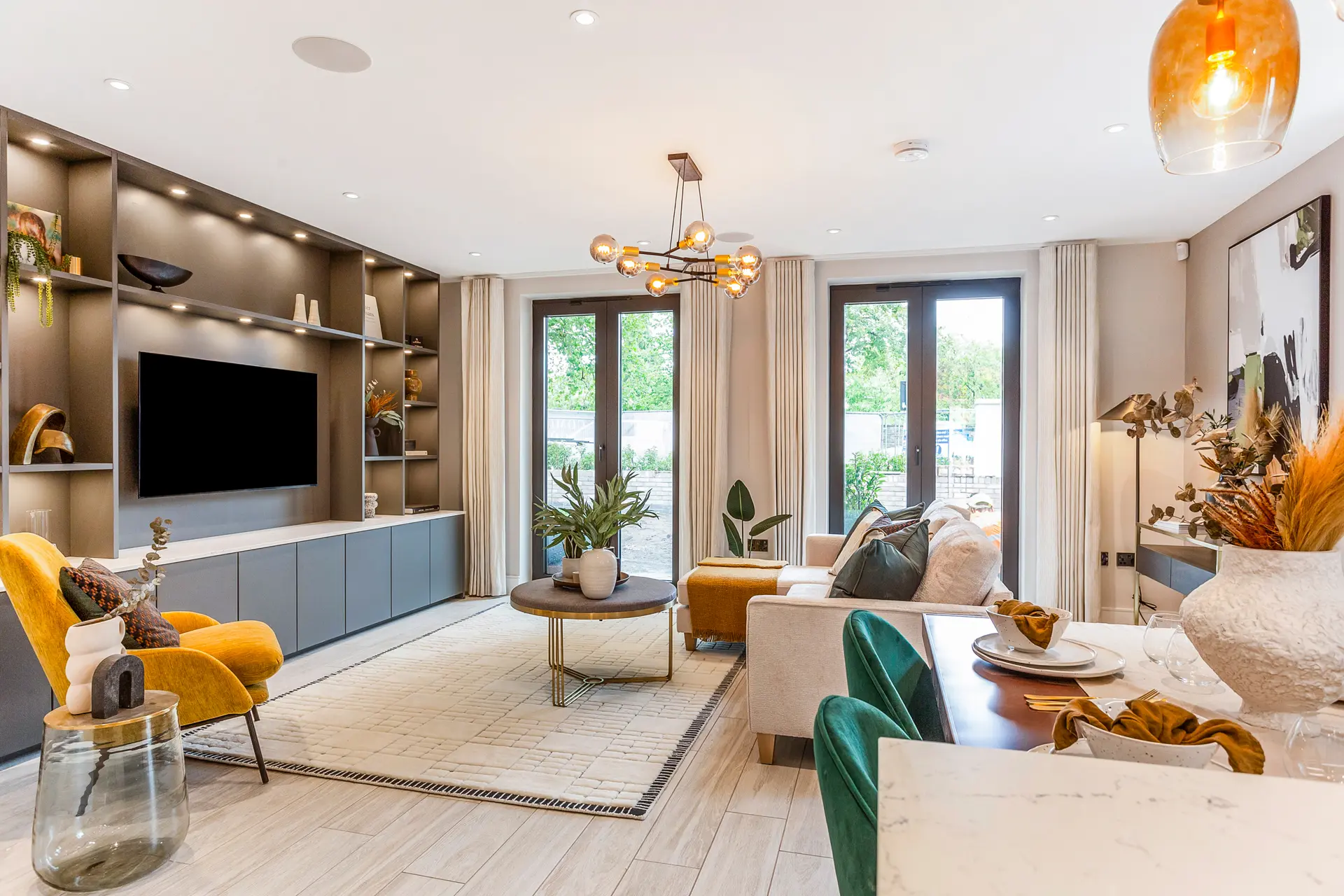 a living room with a tv and a couch